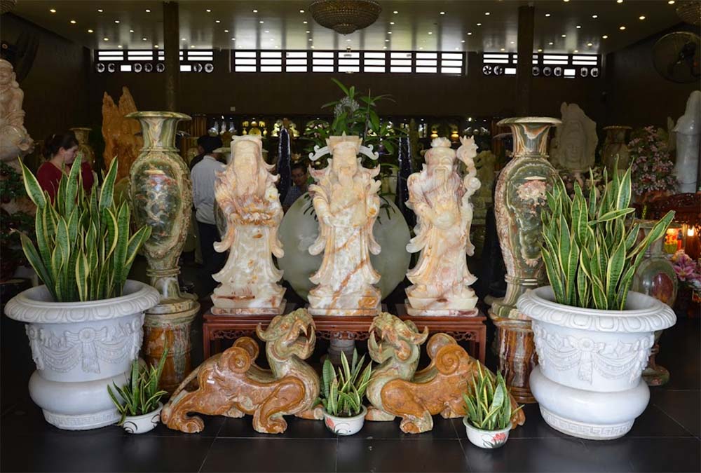 Elegant Marble Sculptures and Ornamental Vases in a Showroom