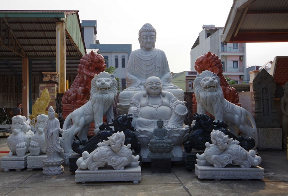 Marble Sculpture Workshop with Intricate Statues on Display