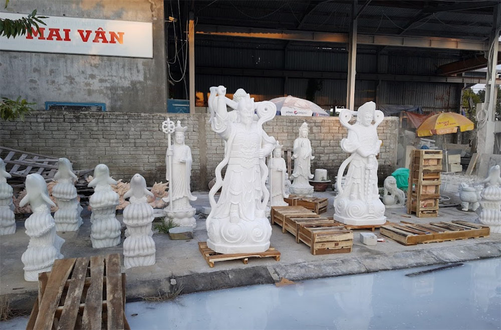 Marble Sculpture Workshop with Intricate Statues on Display