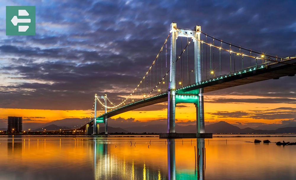 Illuminated Bridge Sunset Reflection At Thuan Phuoc Bridge