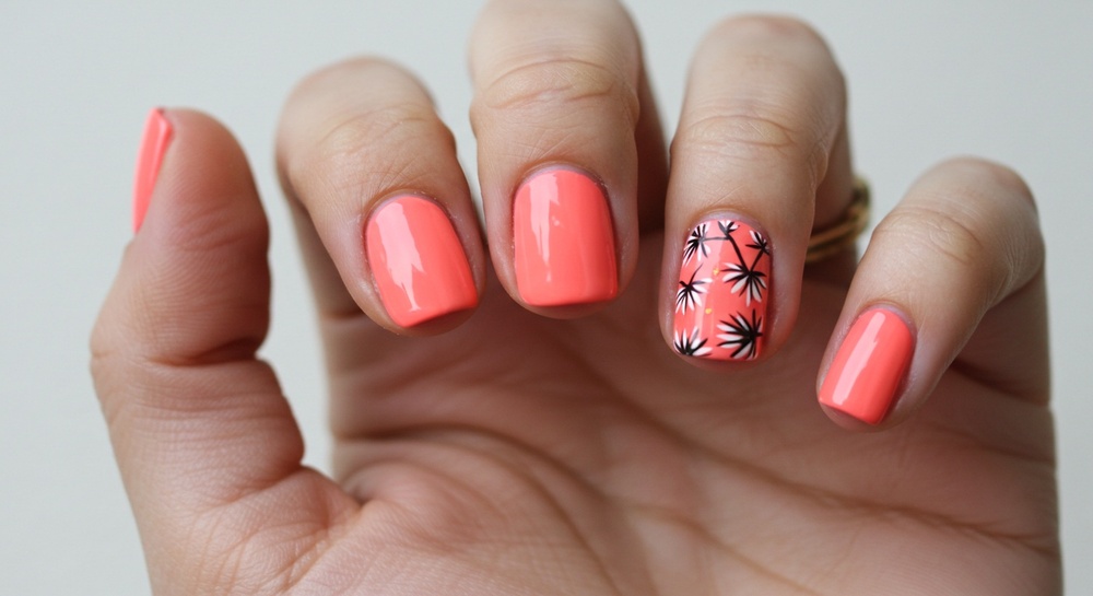 Coral Manicure With Floral Accent