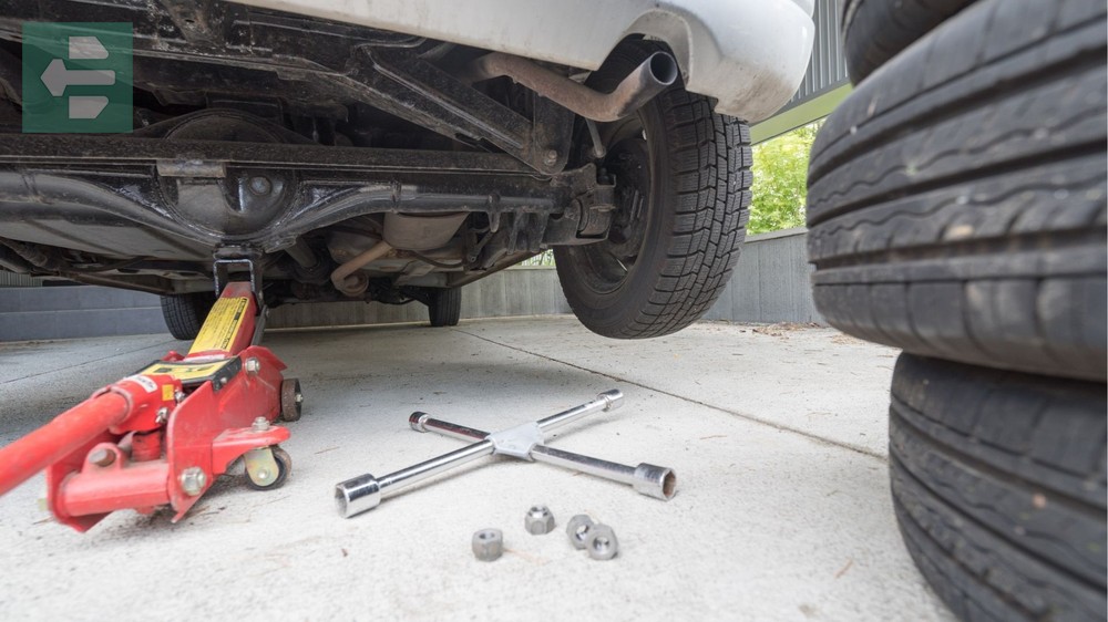 Car jack and lug wrench