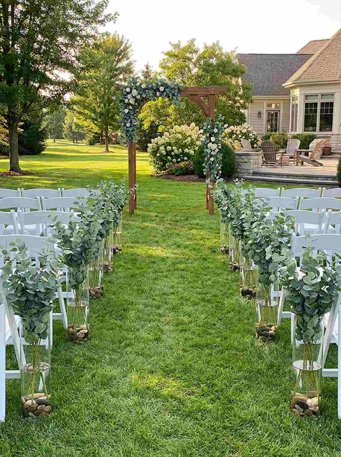 clear glass vases with tall eucalyptus stems