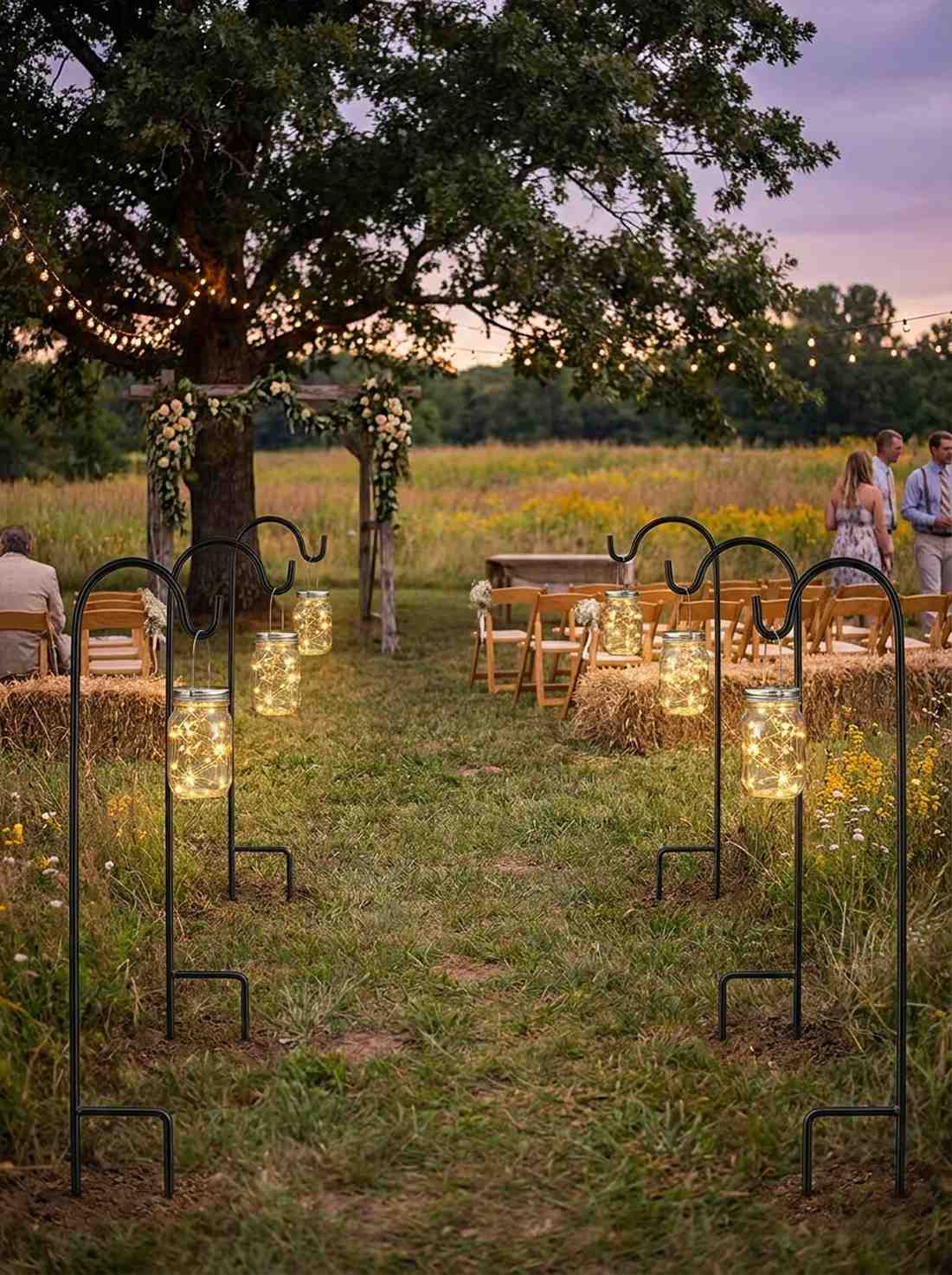 shepherd hooks with hanging mason jar lanterns
