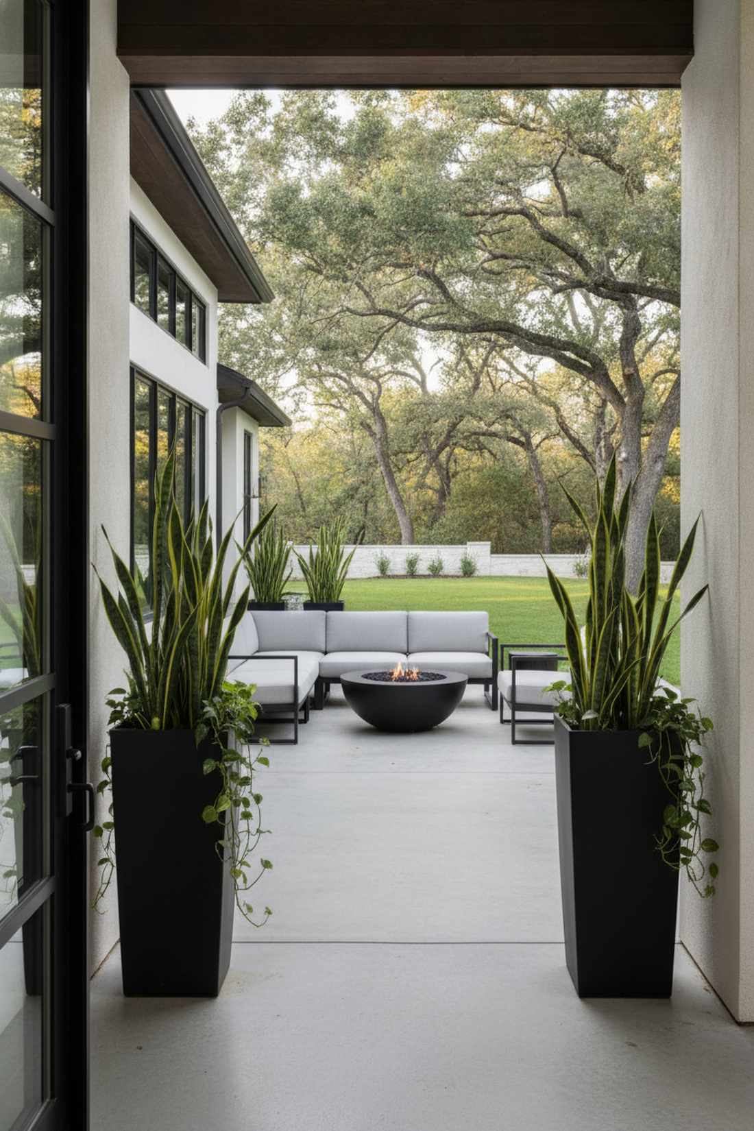 black metal planters as furniture accents