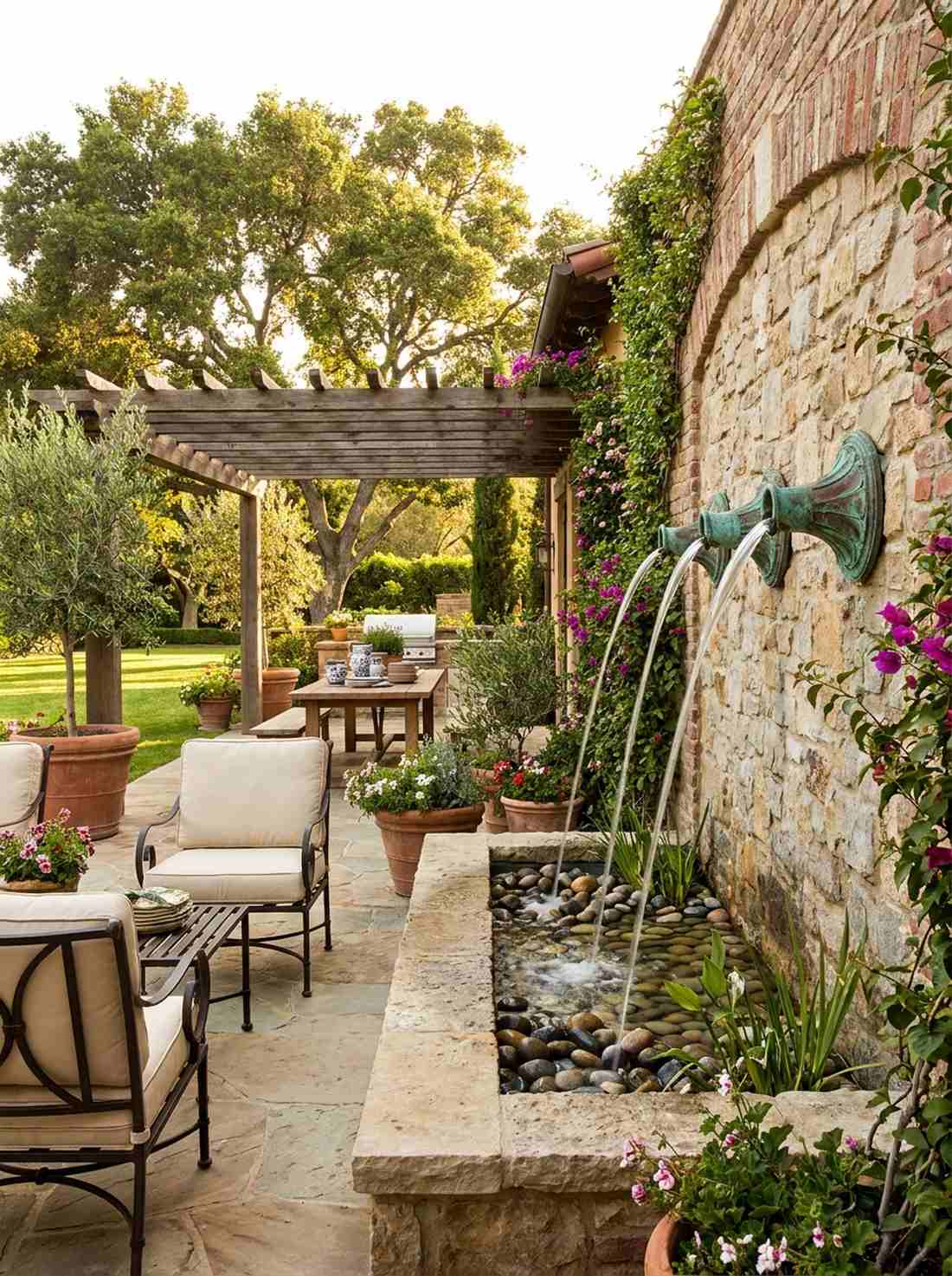 copper spout stone wall