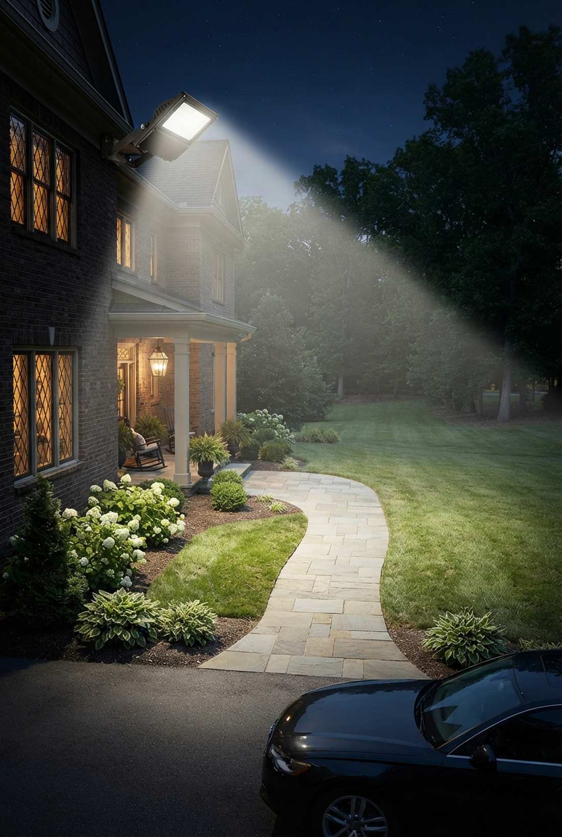 overhead security floodlight angled toward approach path